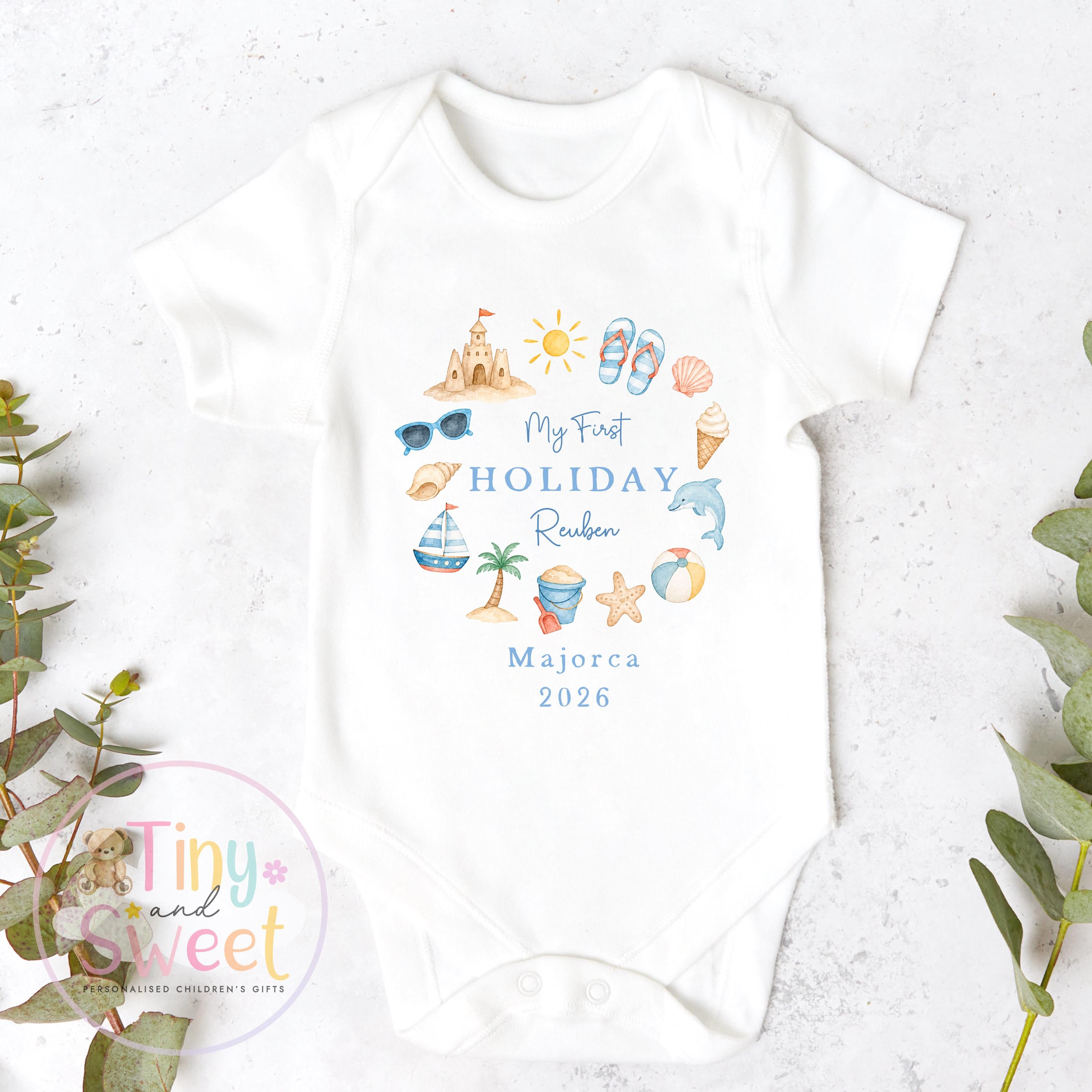 My First Holiday Sleepsuit, Personalised Baby Travel Outfit, Baby’s First Holiday T Shirt, Cute Summer Travel Outfit, My First Holiday