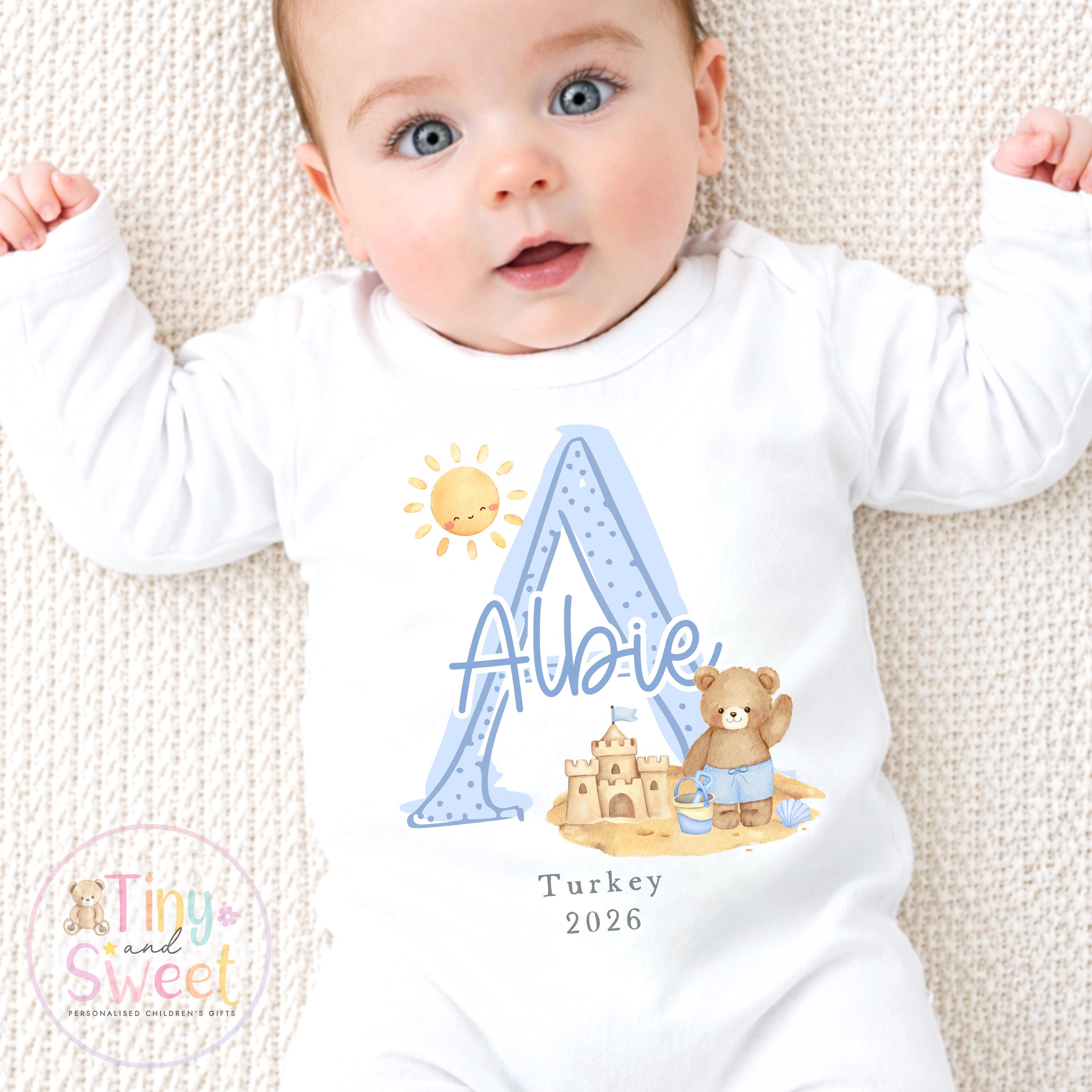 Personalised Holiday Sleepsuit, Personalised Baby Travel Outfit, Baby’s First Holiday T Shirt, Cute Summer Travel Outfit, My First Holiday