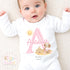 Personalised Holiday Sleepsuit, Personalised Baby Travel Outfit, Baby’s First Holiday T Shirt, Cute Summer Travel Outfit, My First Holiday