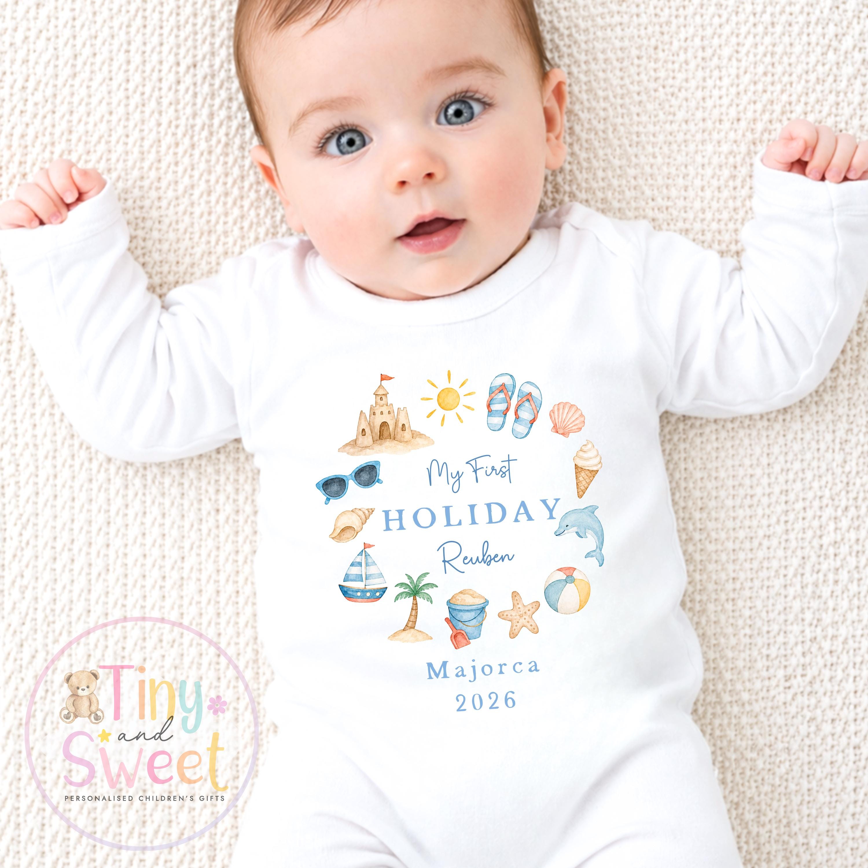 My First Holiday Sleepsuit, Personalised Baby Travel Outfit, Baby’s First Holiday T Shirt, Cute Summer Travel Outfit, My First Holiday